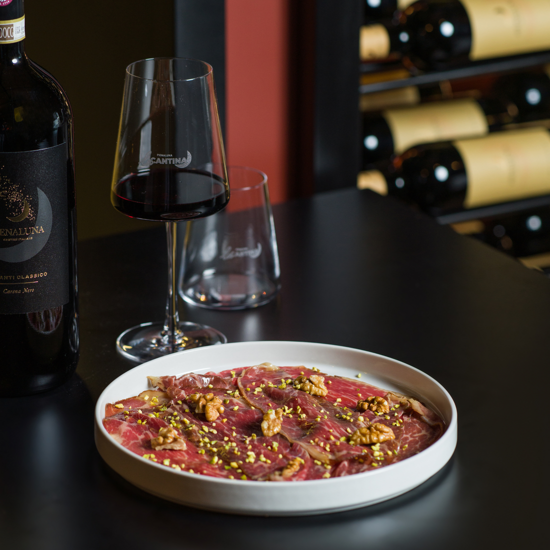 Carpaccio di Black Angus con pistacchio e mandorle